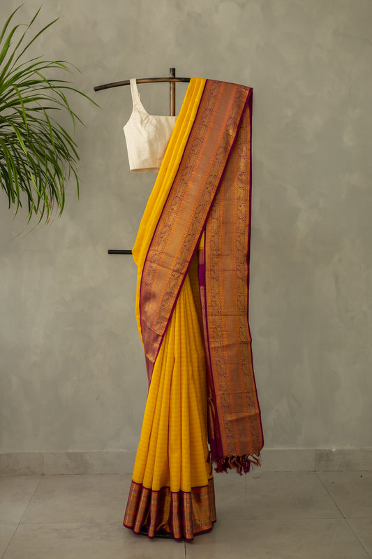 Yellow with Purple Yazhi and Peacock Motif Border Kanjivaram Silk Saree