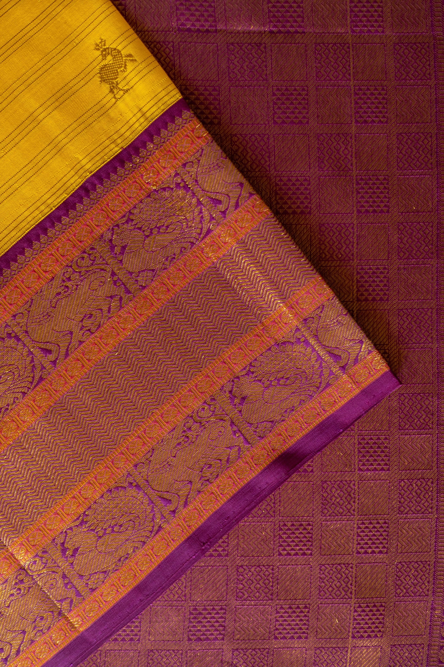 Yellow with Purple Yazhi and Peacock Motif Border Kanjivaram Silk Saree