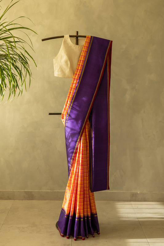 Orange with Pink Checks Kanjivaram Silk Accented by a Purple Pallu Saree