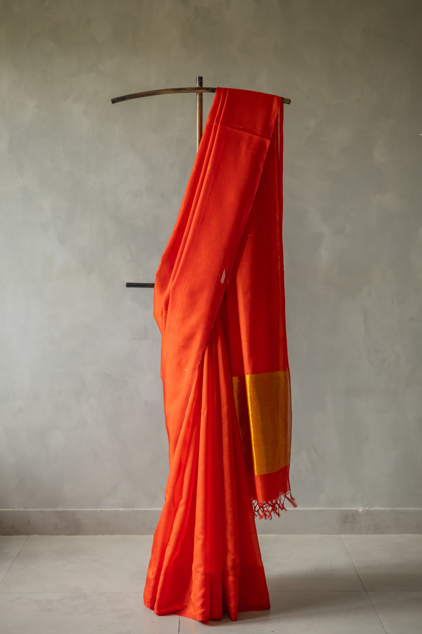 Orange Komarapalayam Silk with Malli Moggu Motifs and Gold Zari Pallu Saree
