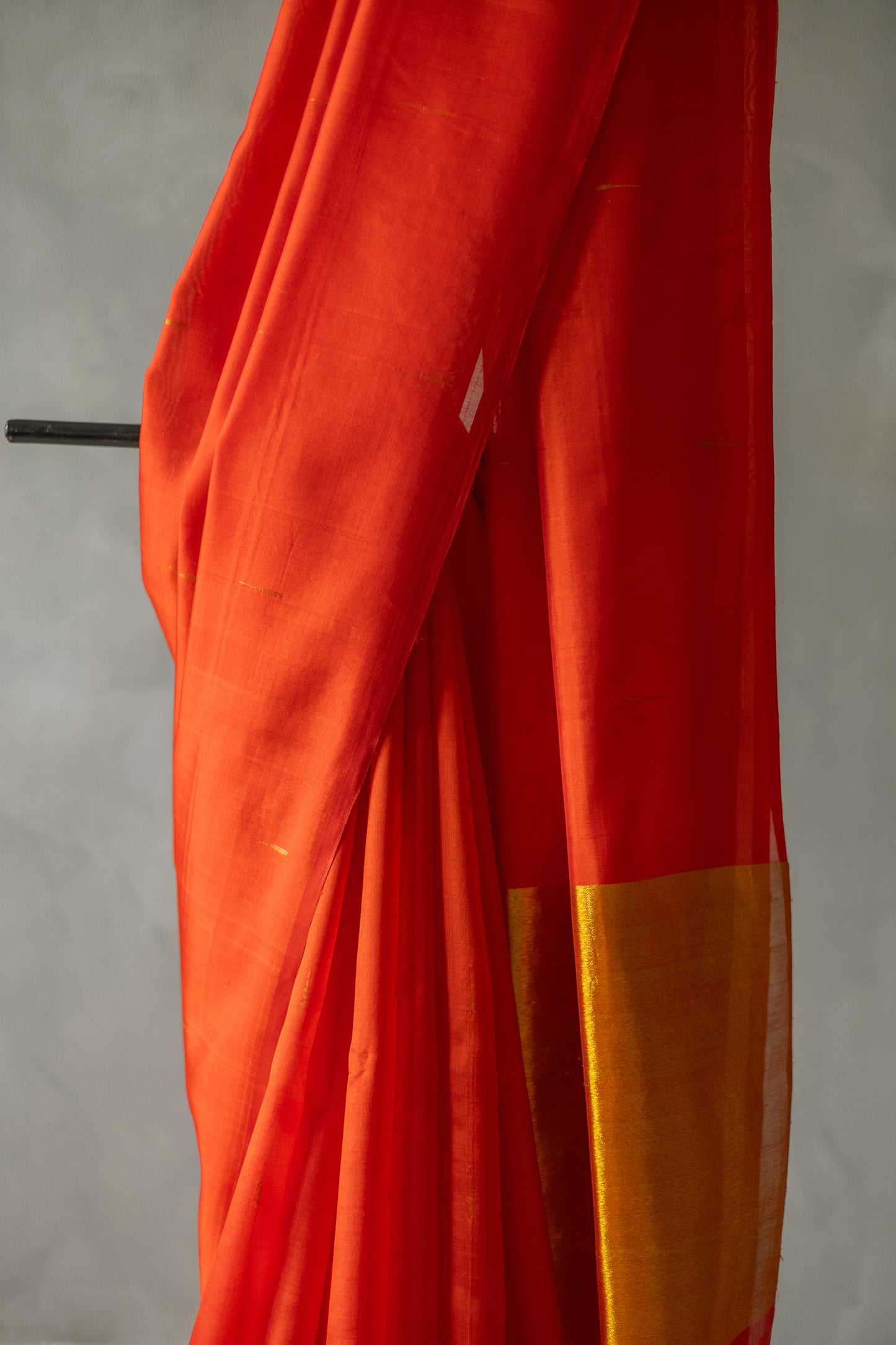 Orange Komarapalayam Silk with Malli Moggu Motifs and Gold Zari Pallu Saree