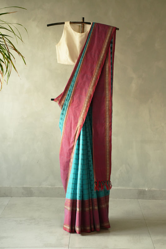 Turquoise Blue Kanchi Cotton Ayiram Butta with Rose Pink Border Saree
