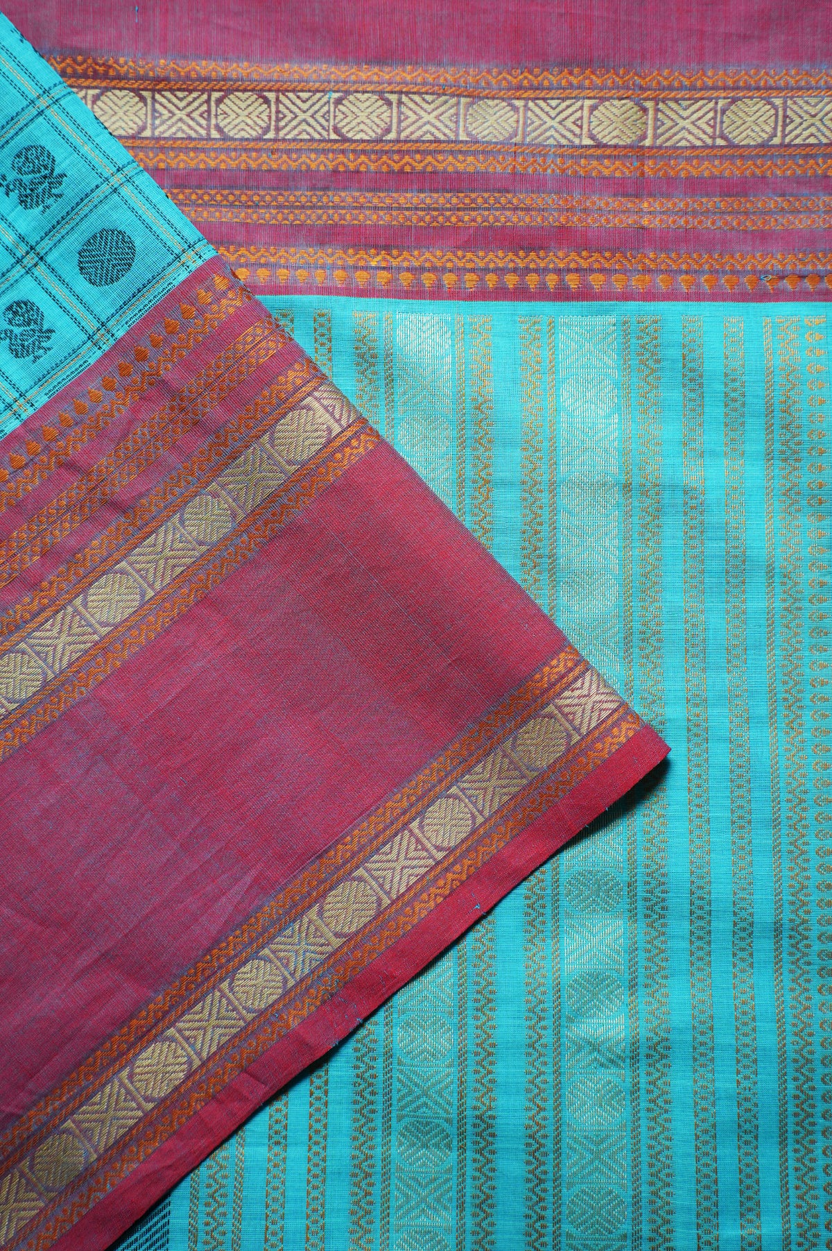 Turquoise Blue Kanchi Cotton Ayiram Butta with Rose Pink Border Saree