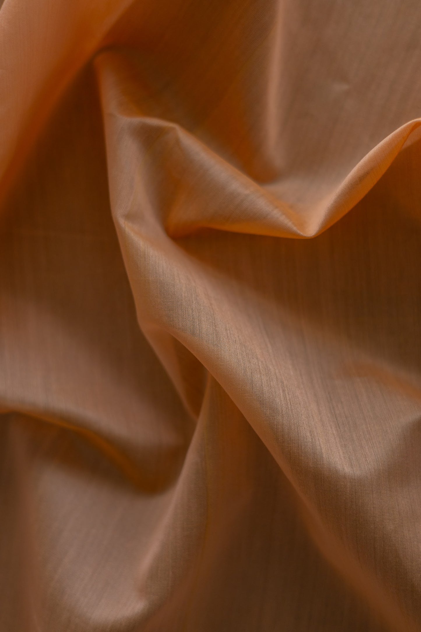 Peach Maheswari Silk Plain Body Stripped Border Saree