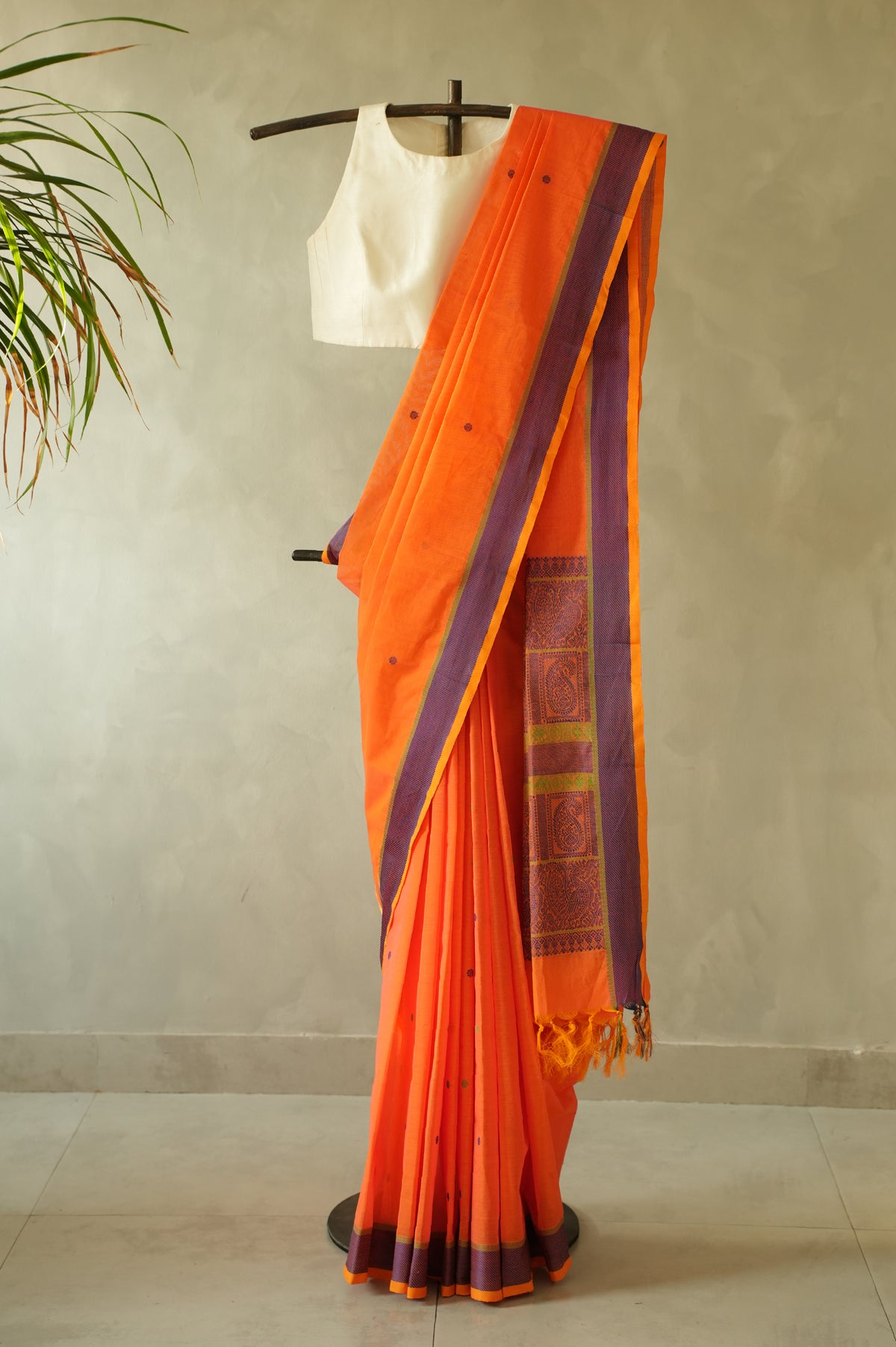 Fanta Orange Kanchi Cotton with Violet and Leaf Green Border Saree