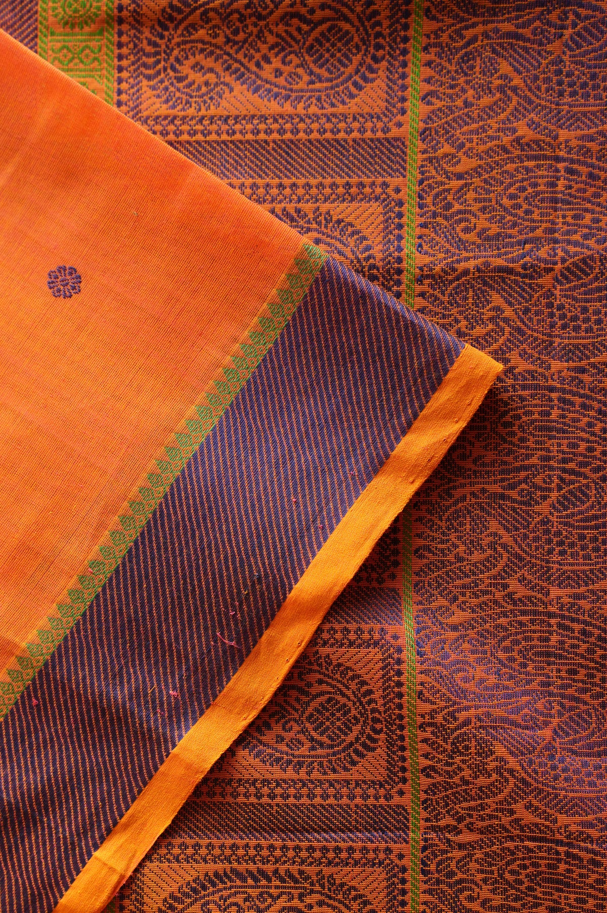 Fanta Orange Kanchi Cotton with Violet and Leaf Green Border Saree