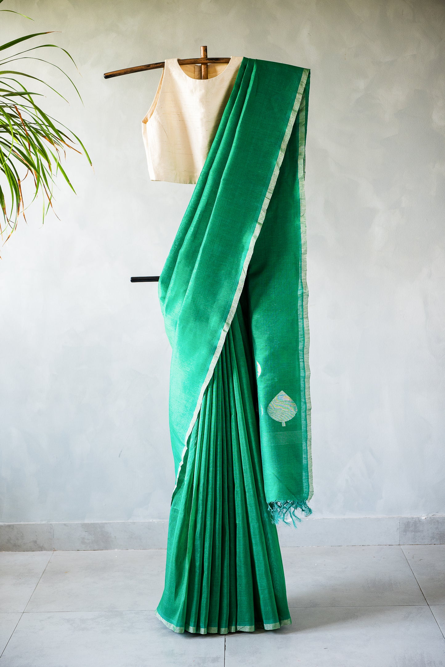 Emerald Green Linen by Silk Saree with Silver Zari Border