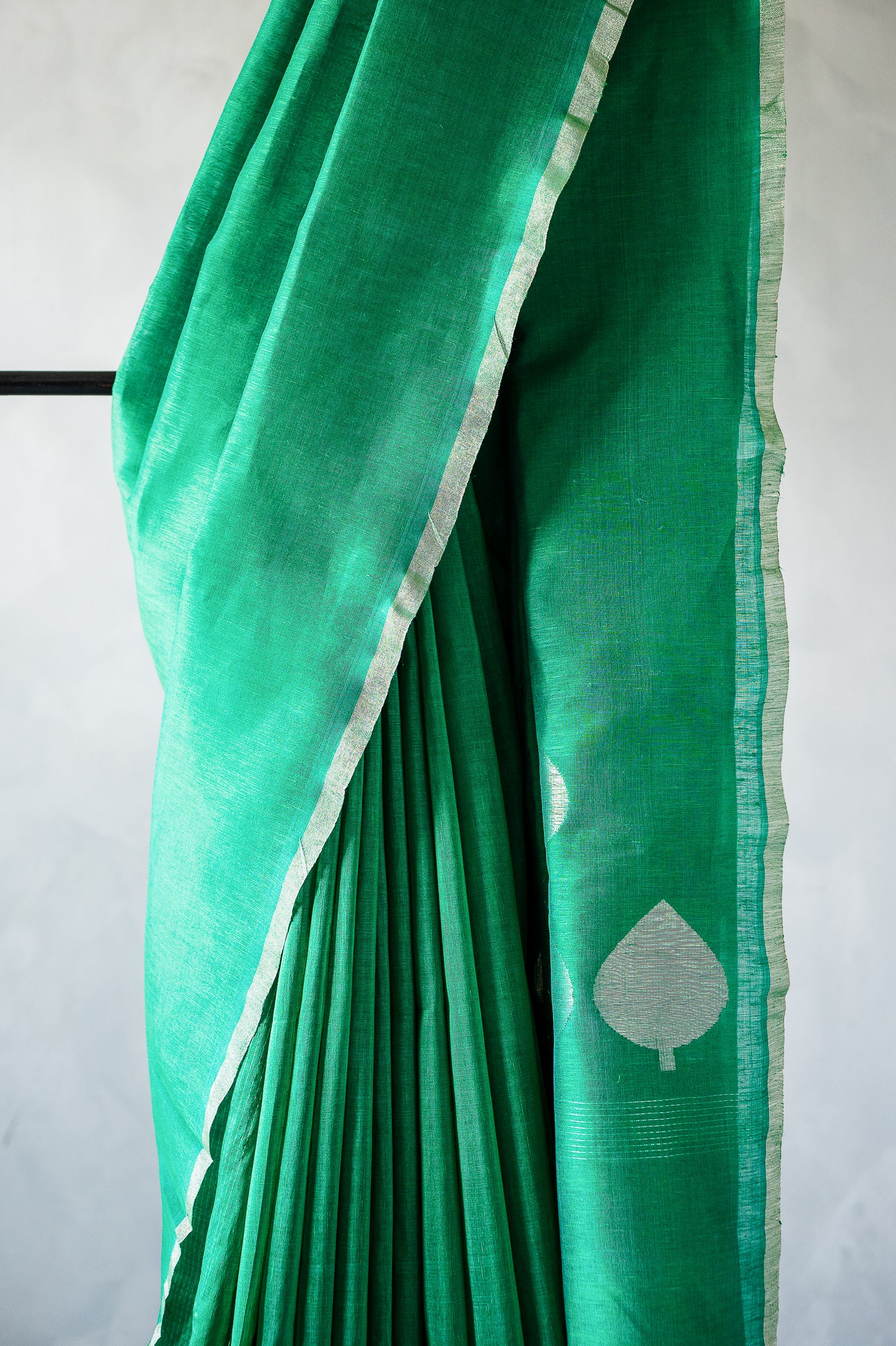 Emerald Green Linen by Silk Saree with Silver Zari Border