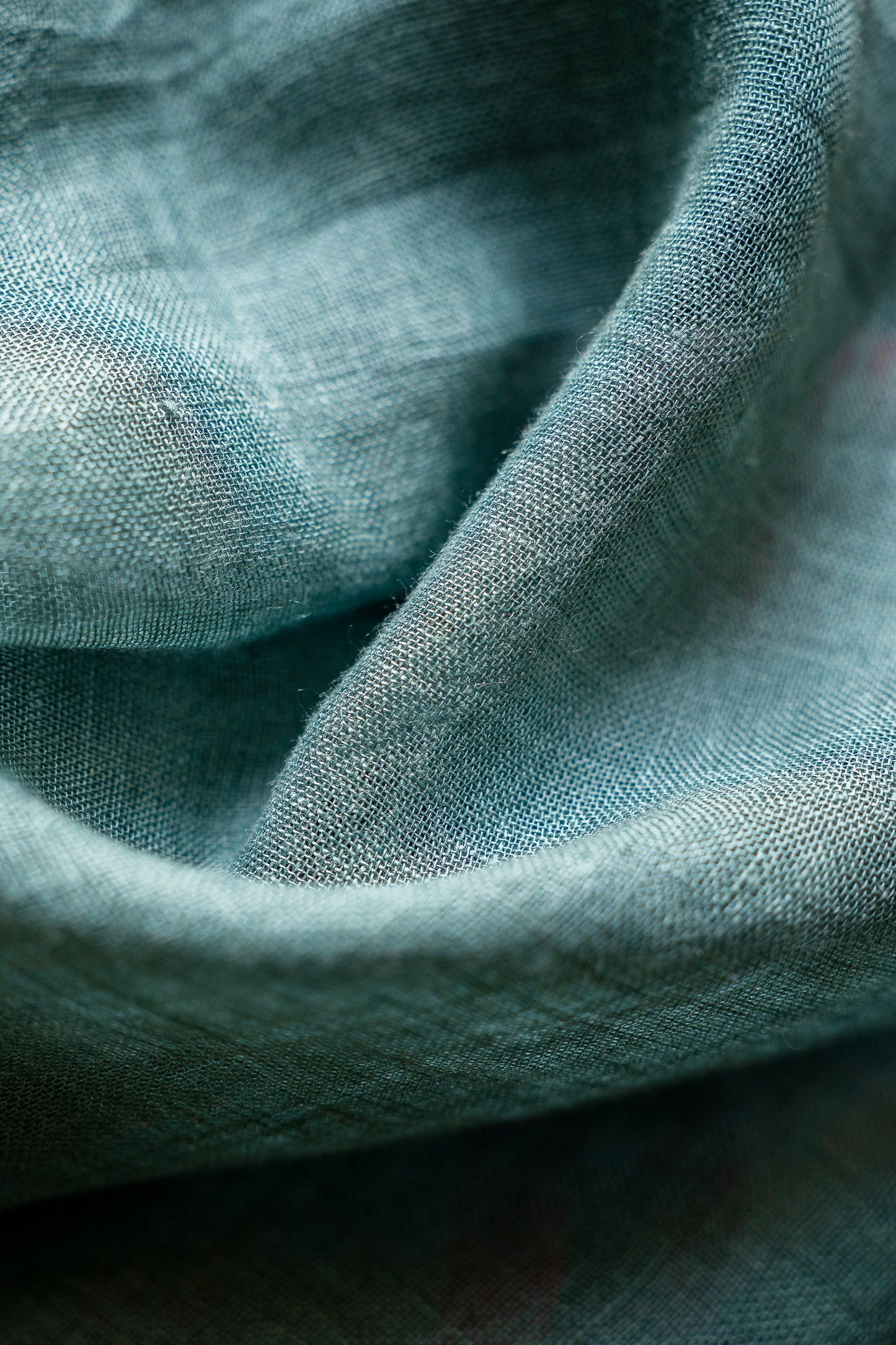 Sage Green Linen Saree with a Vibrant Red Selvedge.