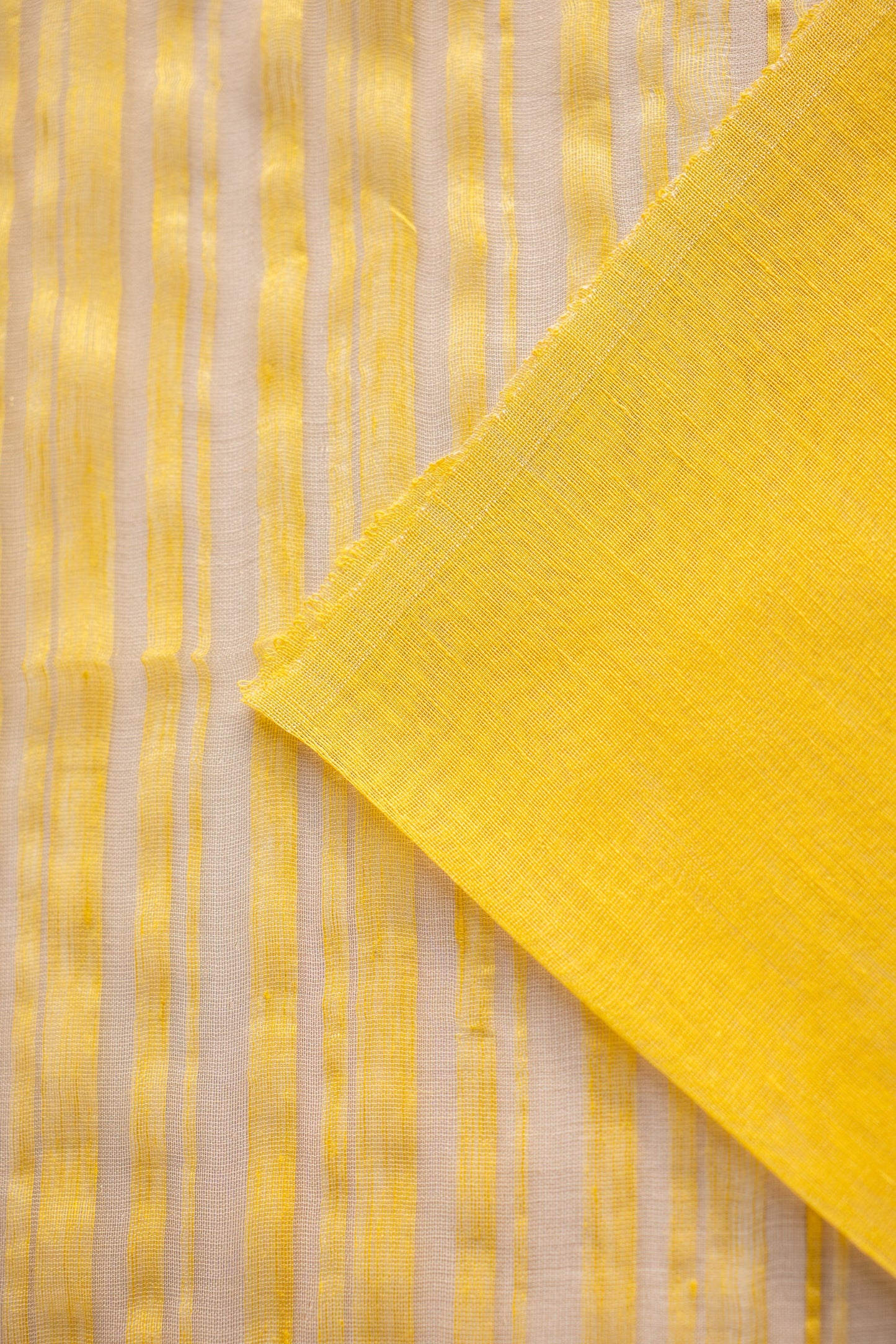 Sunshine Yellow Linen by Silk with Self-Woven Striped Pallu Saree