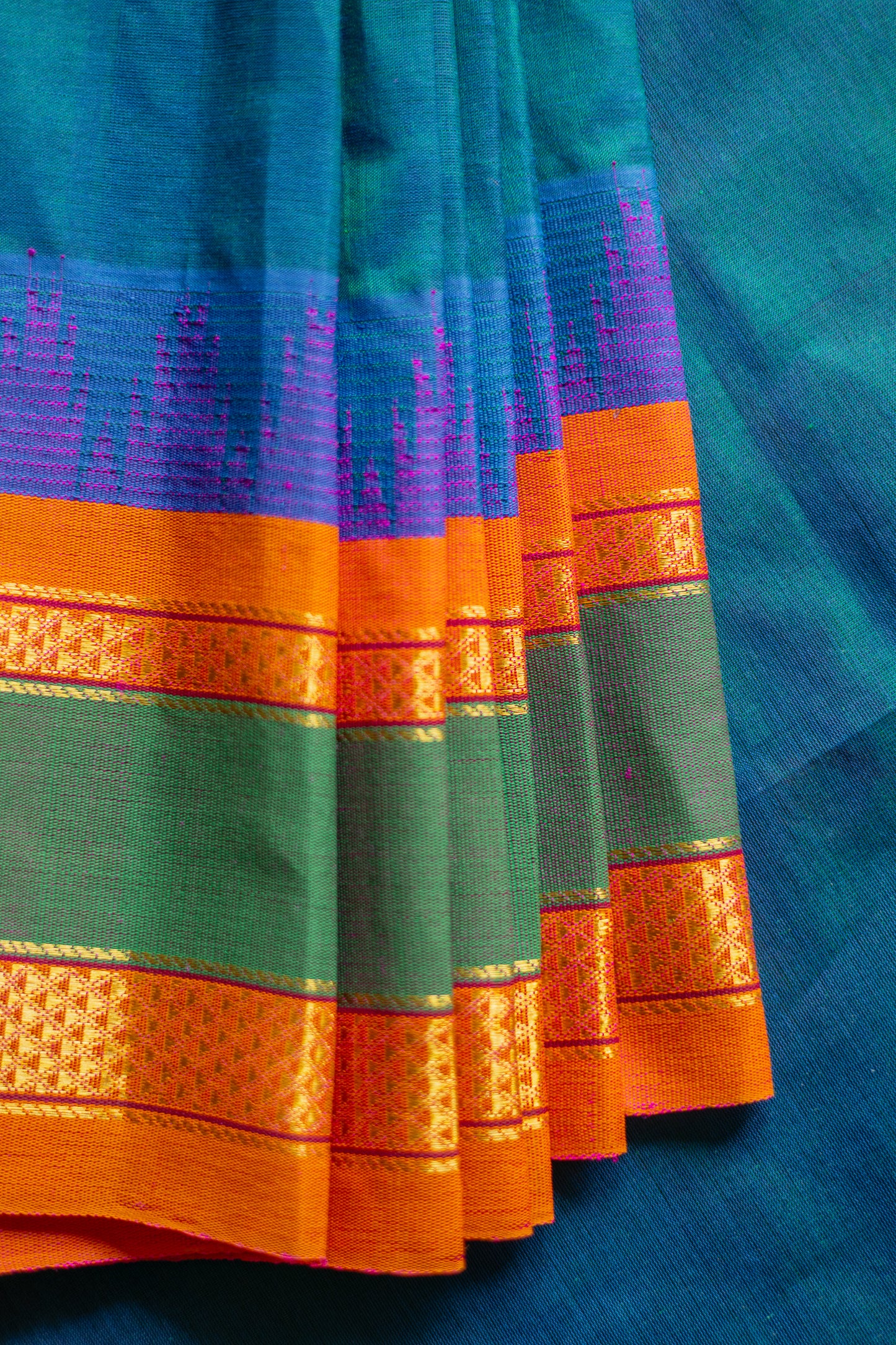 Blue Silk Cotton with Big Orange and Green Border Saree