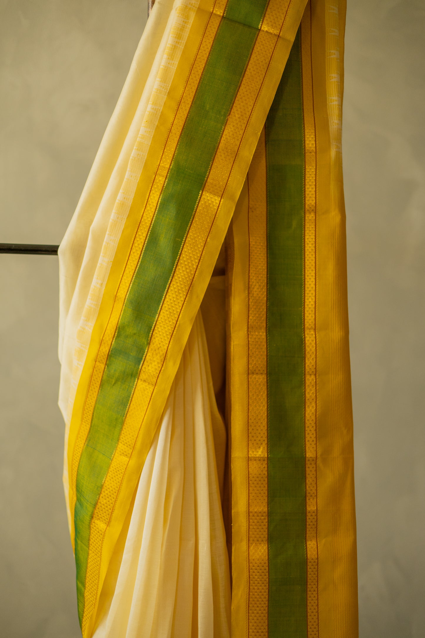 Off White Silk Cotton with Big Yellow and Green Border Saree
