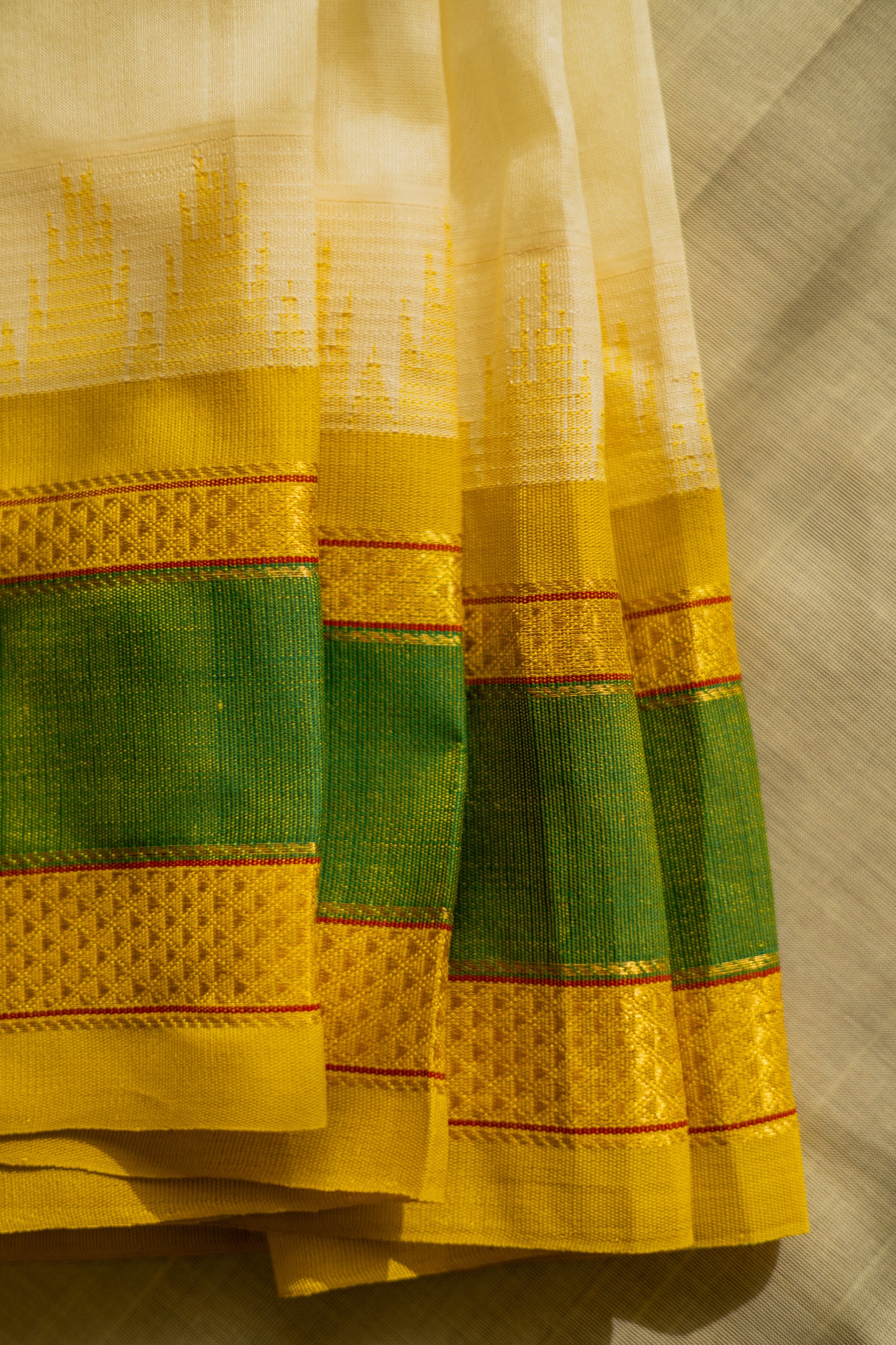 Off White Silk Cotton with Big Yellow and Green Border Saree