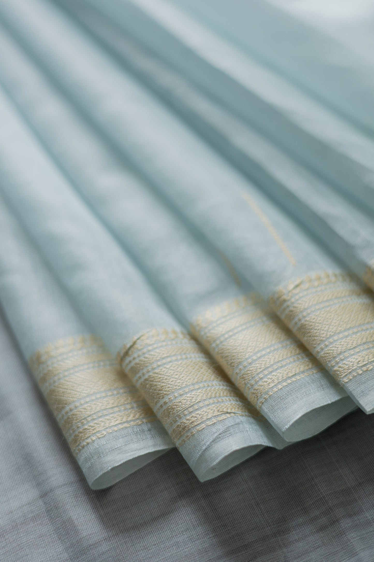Powder Blue Silk Cotton Tissue Doby Border Khapa Line Pallu Saree