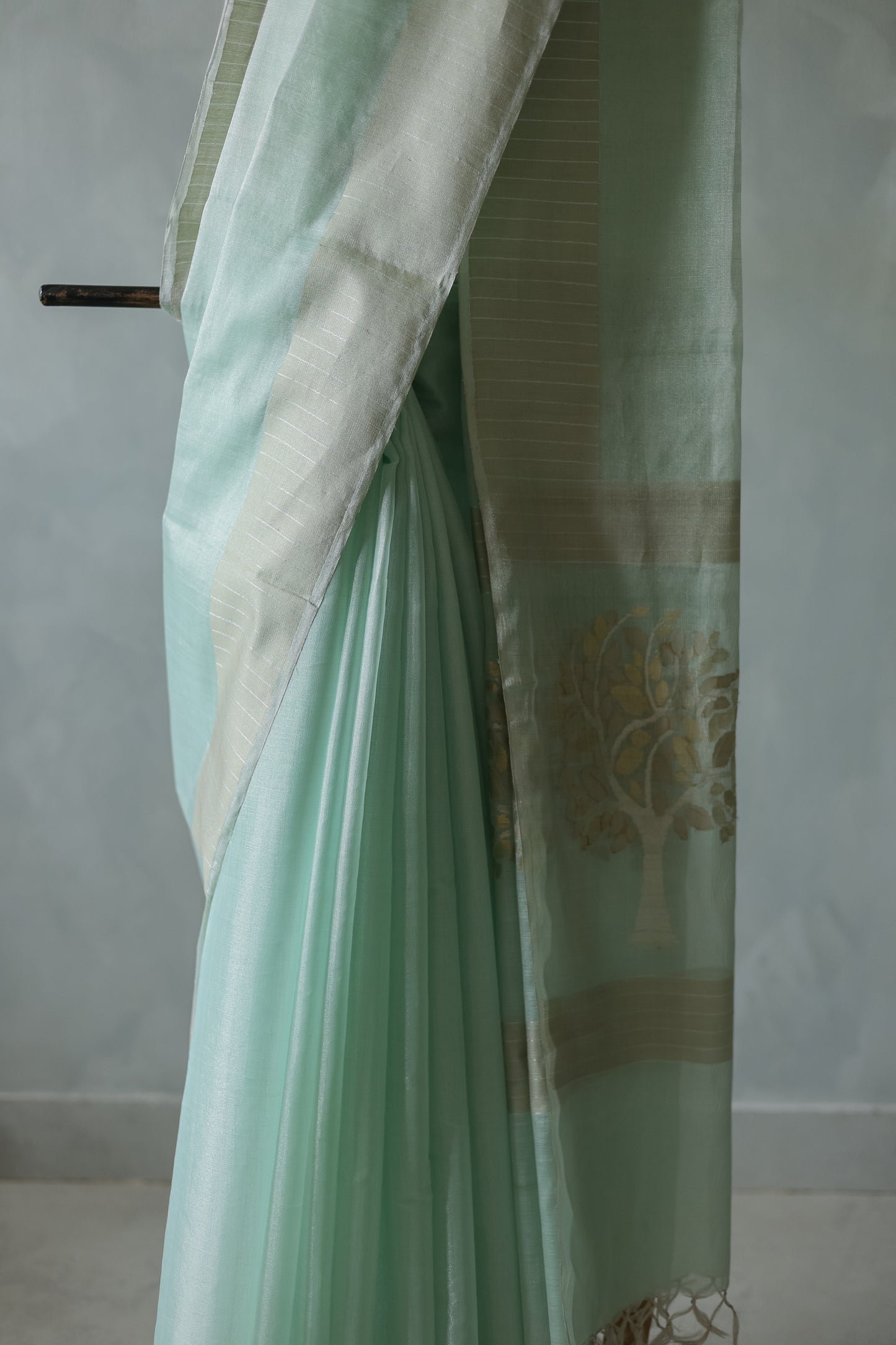 Sea Green Silk Cotton Tissue Zari Line with Hand Embroidered Tree Pallu Saree