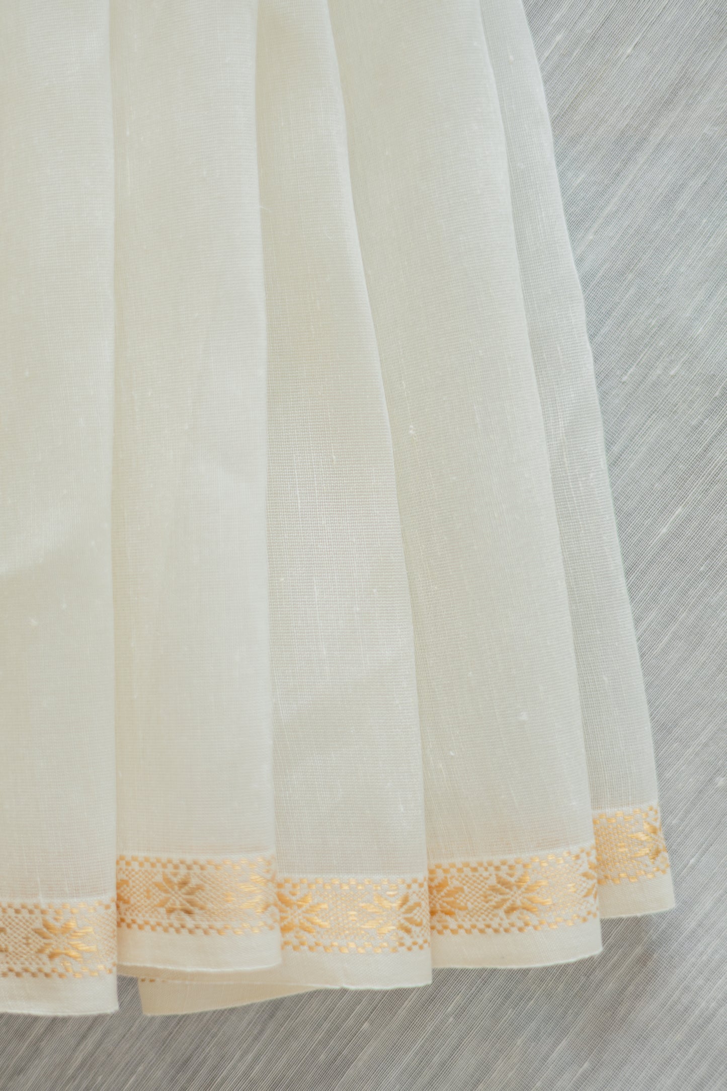 White Silk Linen with Small Gold Border Saree