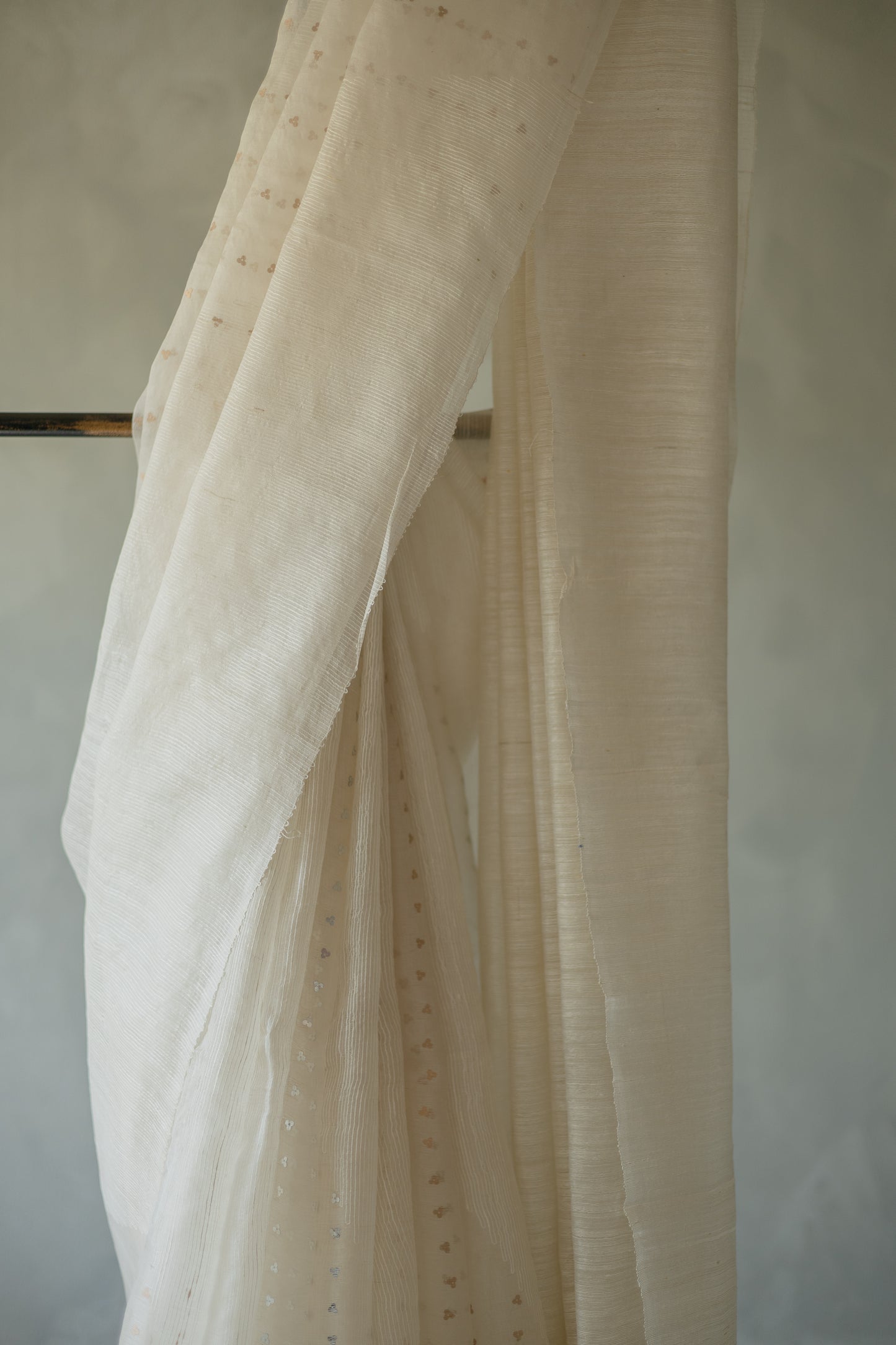 Off White Tissue Linen with Silver and Gold Sequins Saree