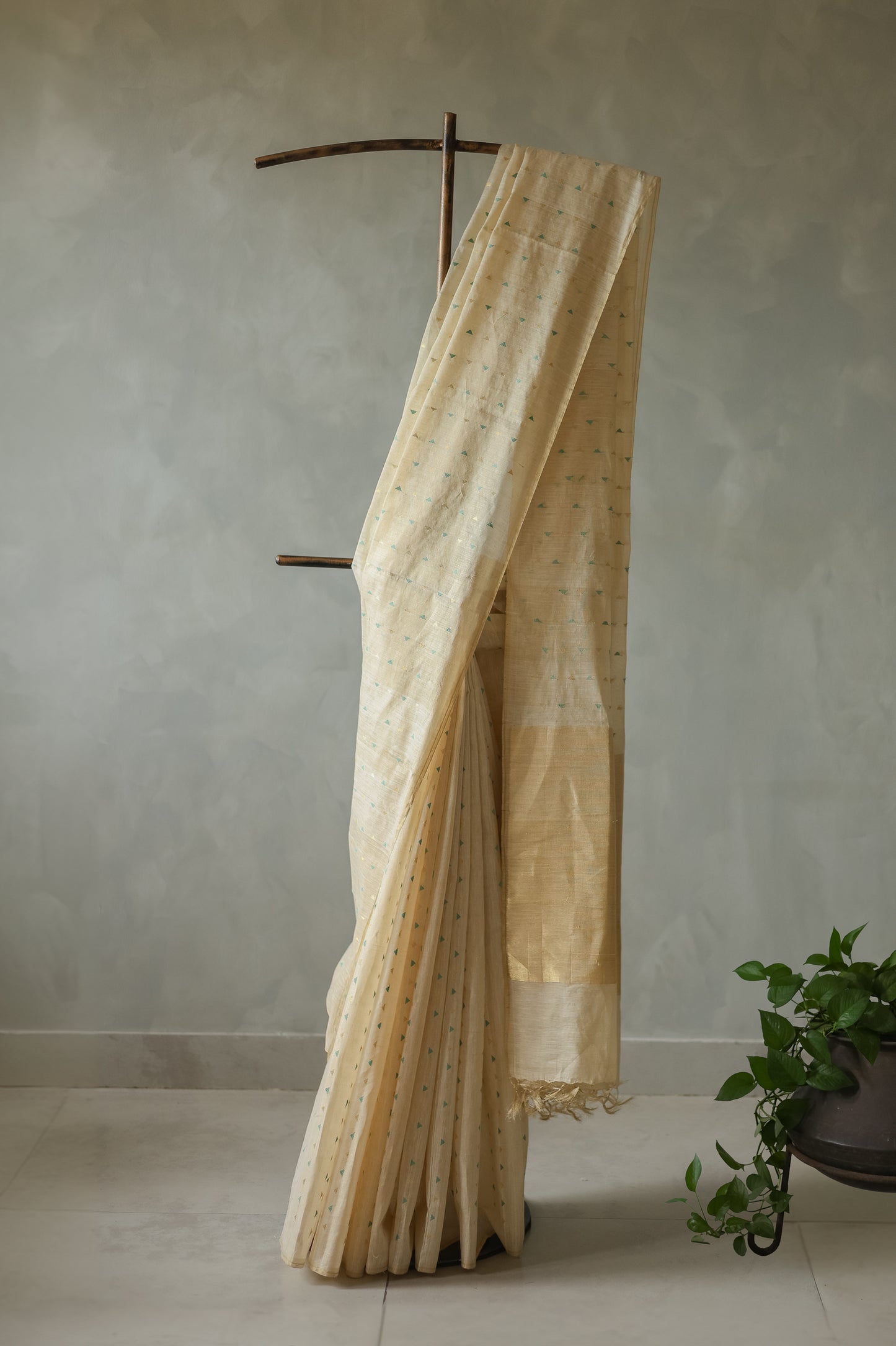 Off White Tussar with Green and Gold Triangle Woven Motif Saree