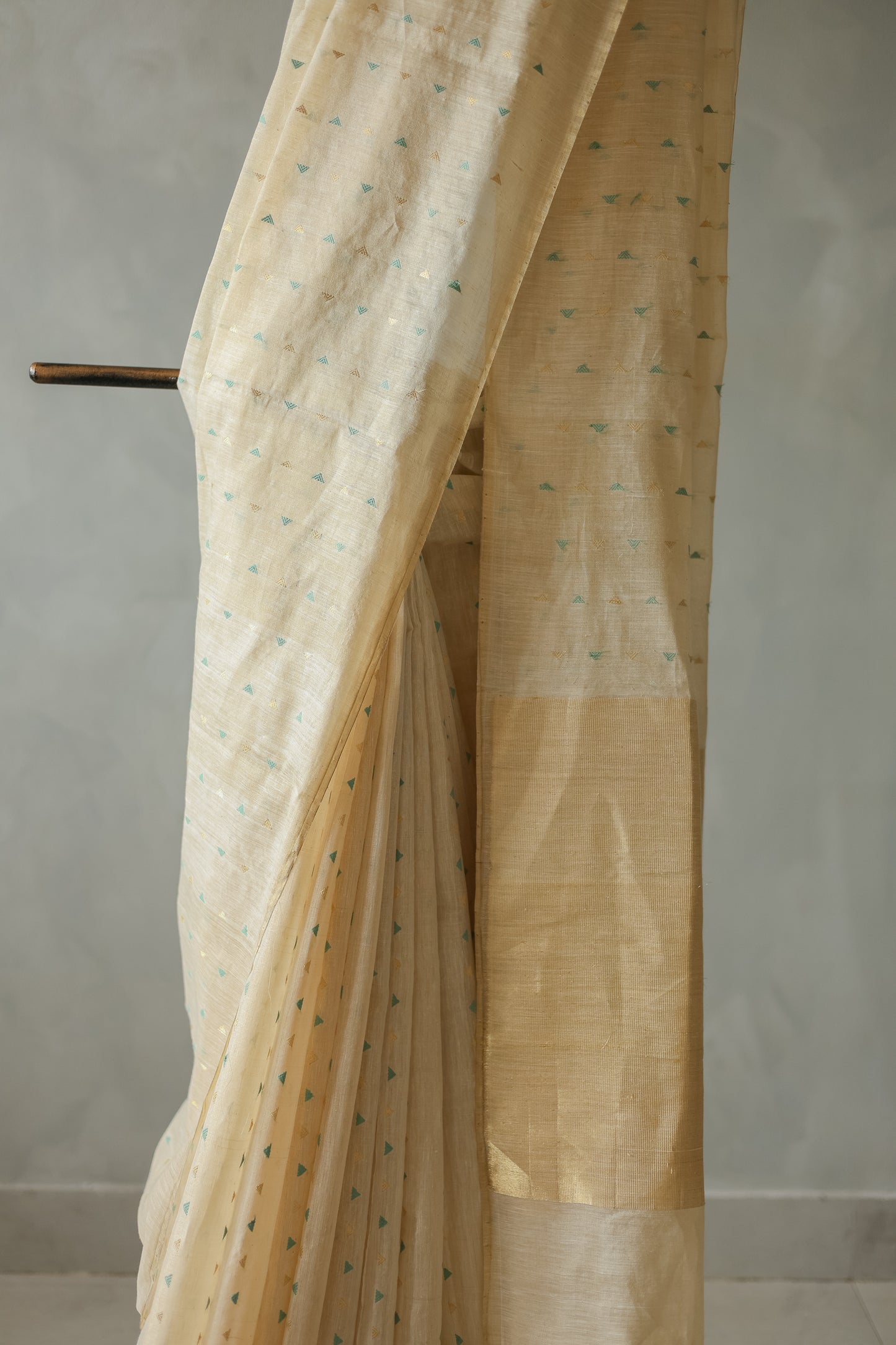 Off White Tussar with Green and Gold Triangle Woven Motif Saree