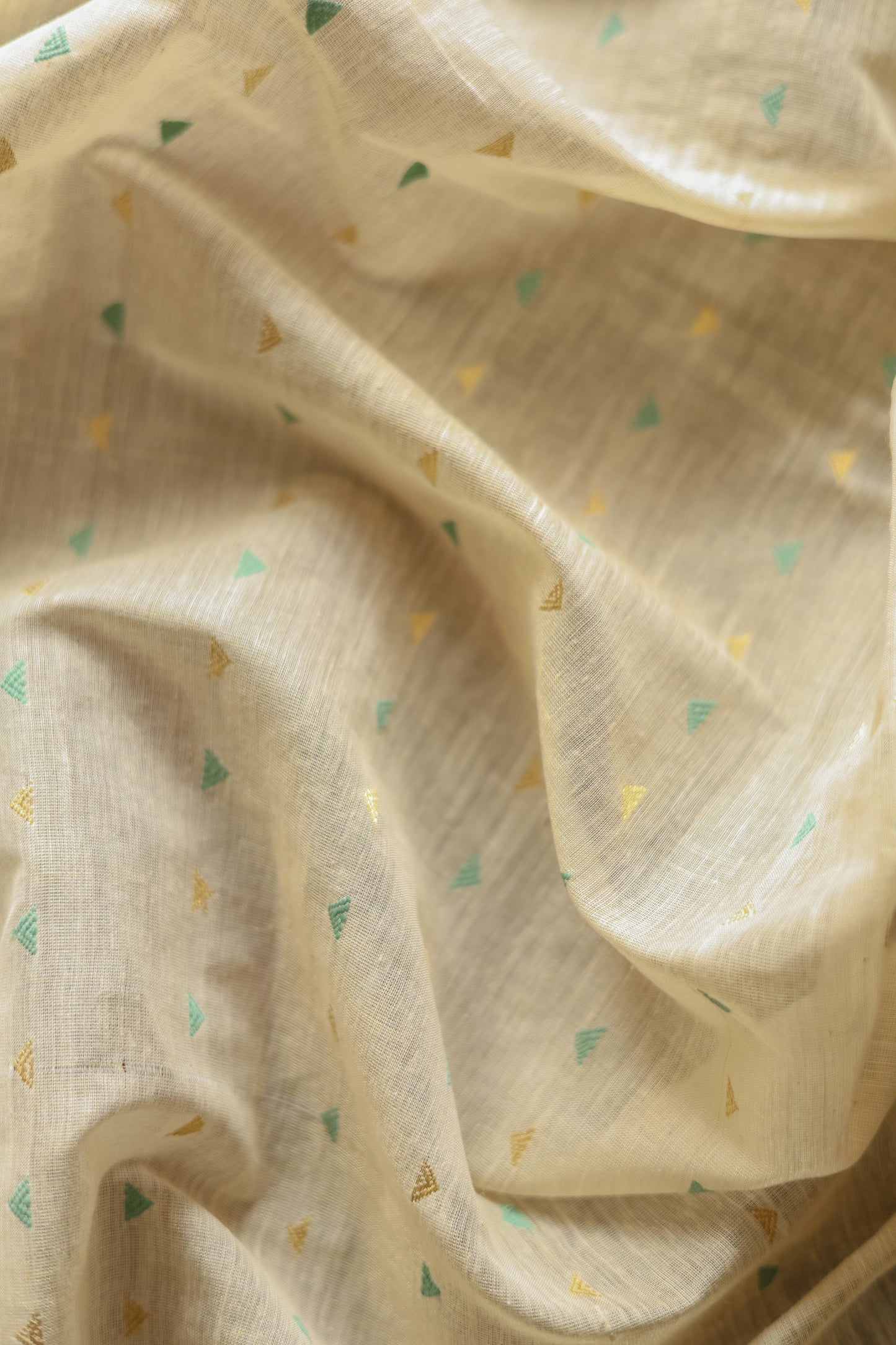 Off White Tussar with Green and Gold Triangle Woven Motif Saree