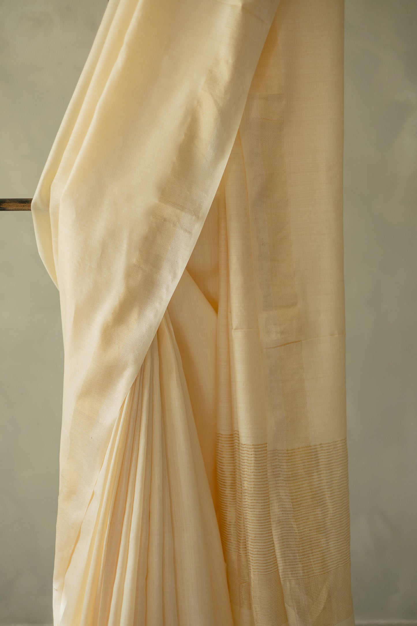 Off White Tussar Muga with Gold and Silver Border Saree