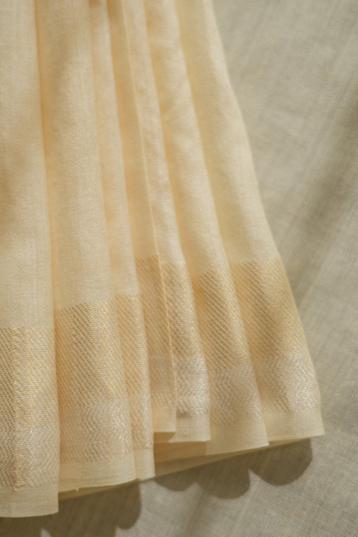 Off White Tussar Muga with Gold and Silver Border Saree