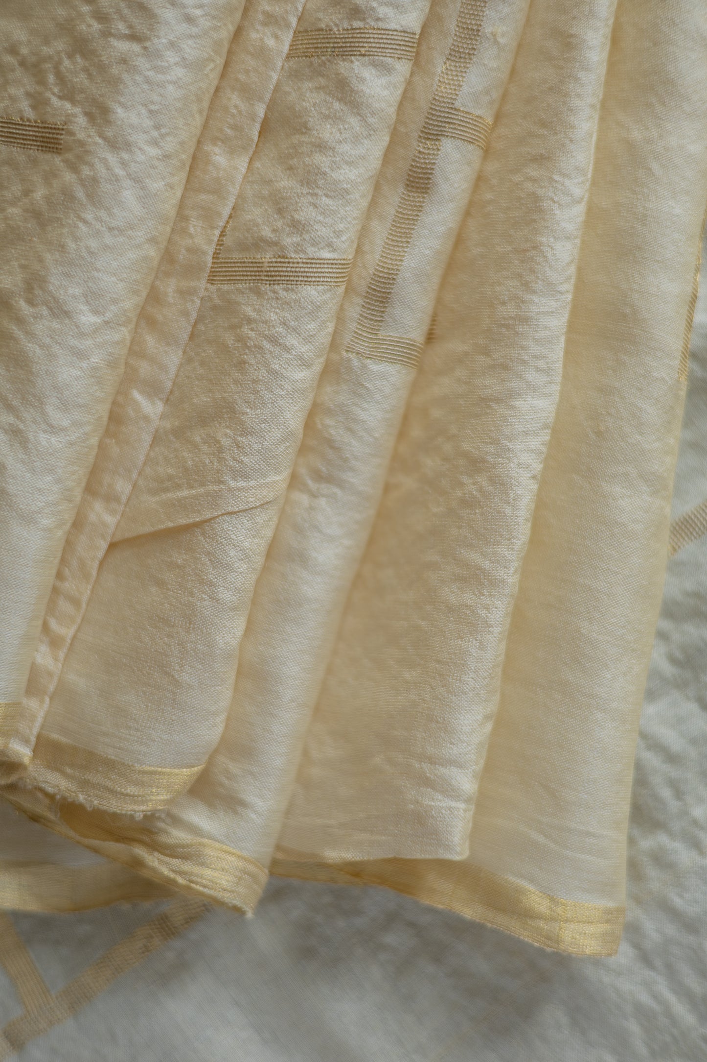 Off White Tussar with Gold Zari and an All-Over Geometric Design Saree