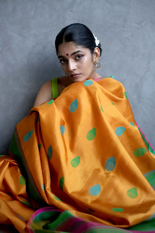 Marigold Orange Kanjivaram Silk Saree with Turquoise and Green Buttas and Contrast Green Border