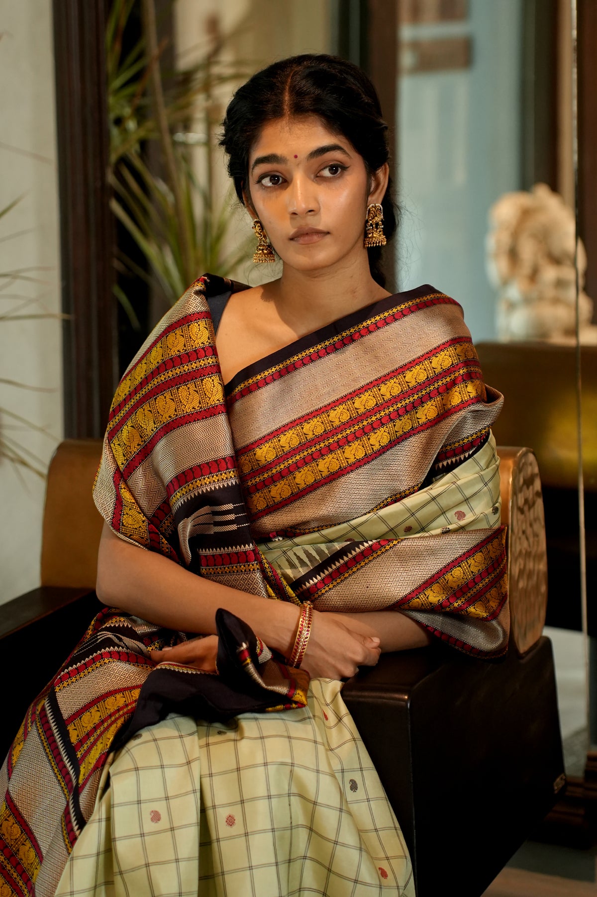 Ivory Cream Kanjivaram Silk Saree with Black, Mustard Yellow and Red Thread Work Border