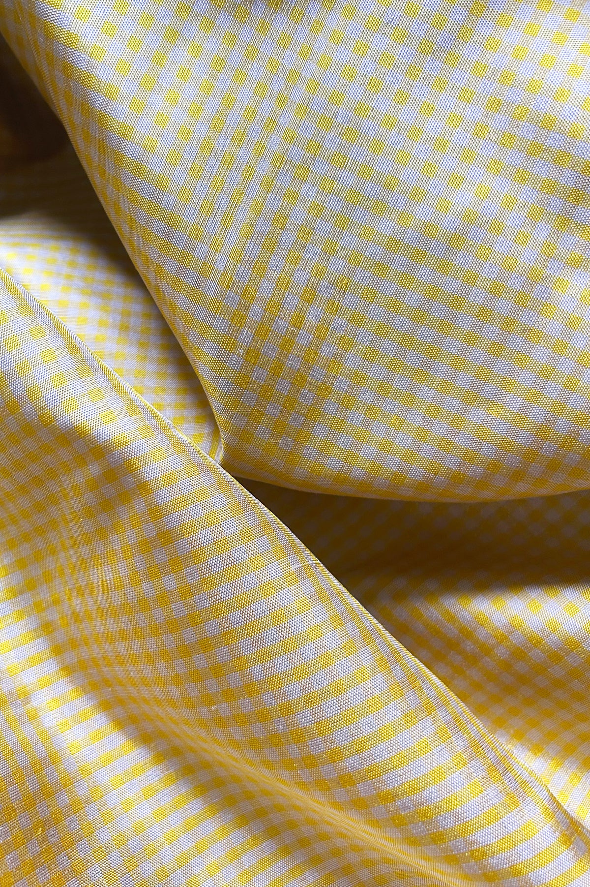 Mustard yellow and off white micro checks sari with grey pallu and blouse