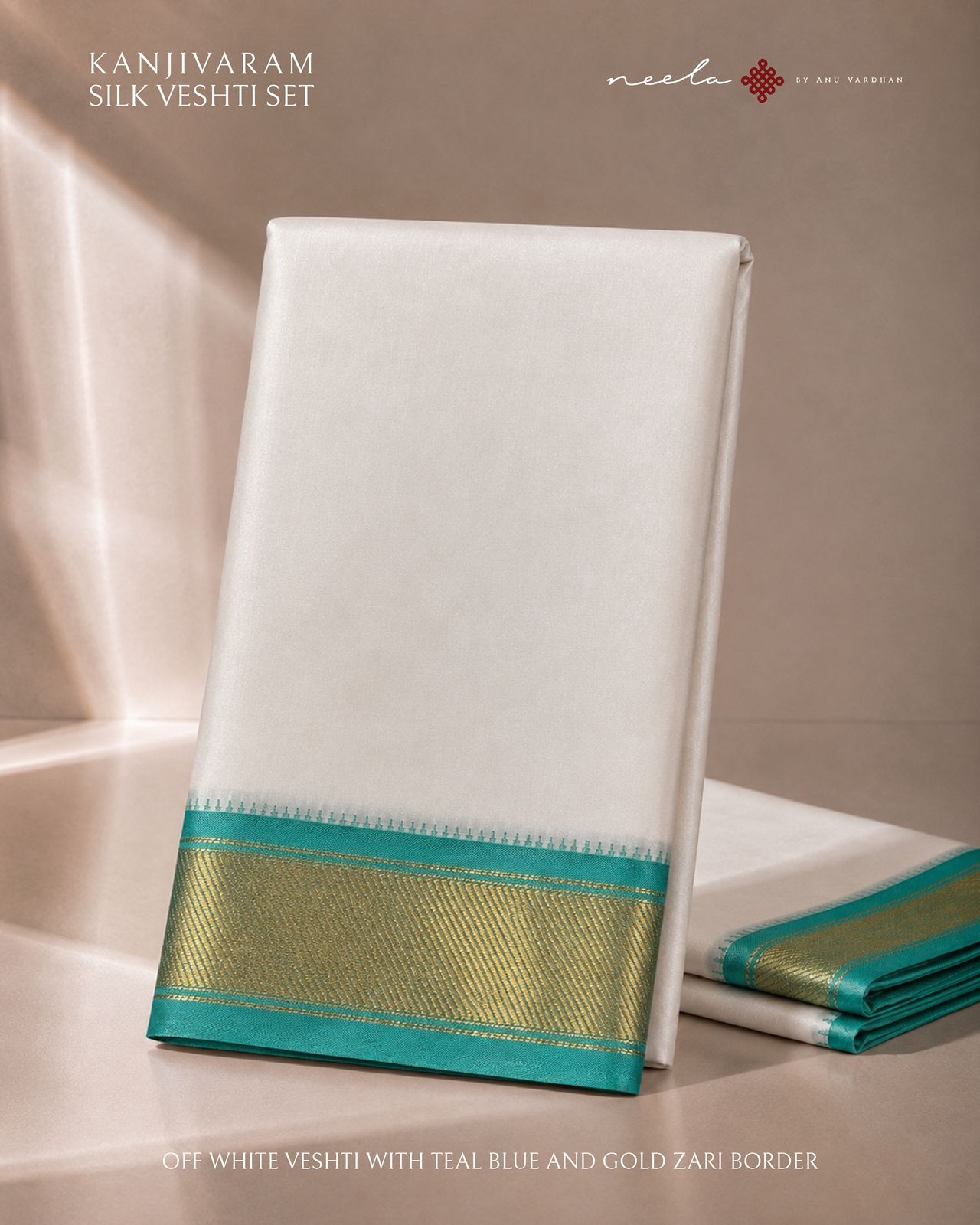 Off White Kanjivaram Silk Vesti with Teal  Blue and Gold Zari Border