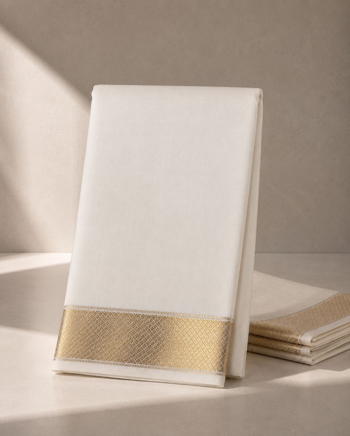 White Veshti with Gold Zari Kan Pettu Border