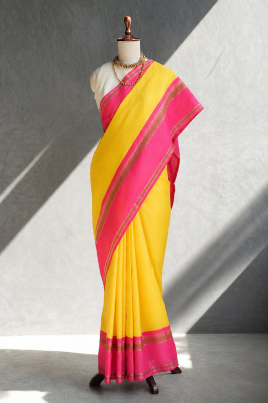 Sunshine Yellow Kanjivaram Silk with Rani Pink and Zari Border Saree