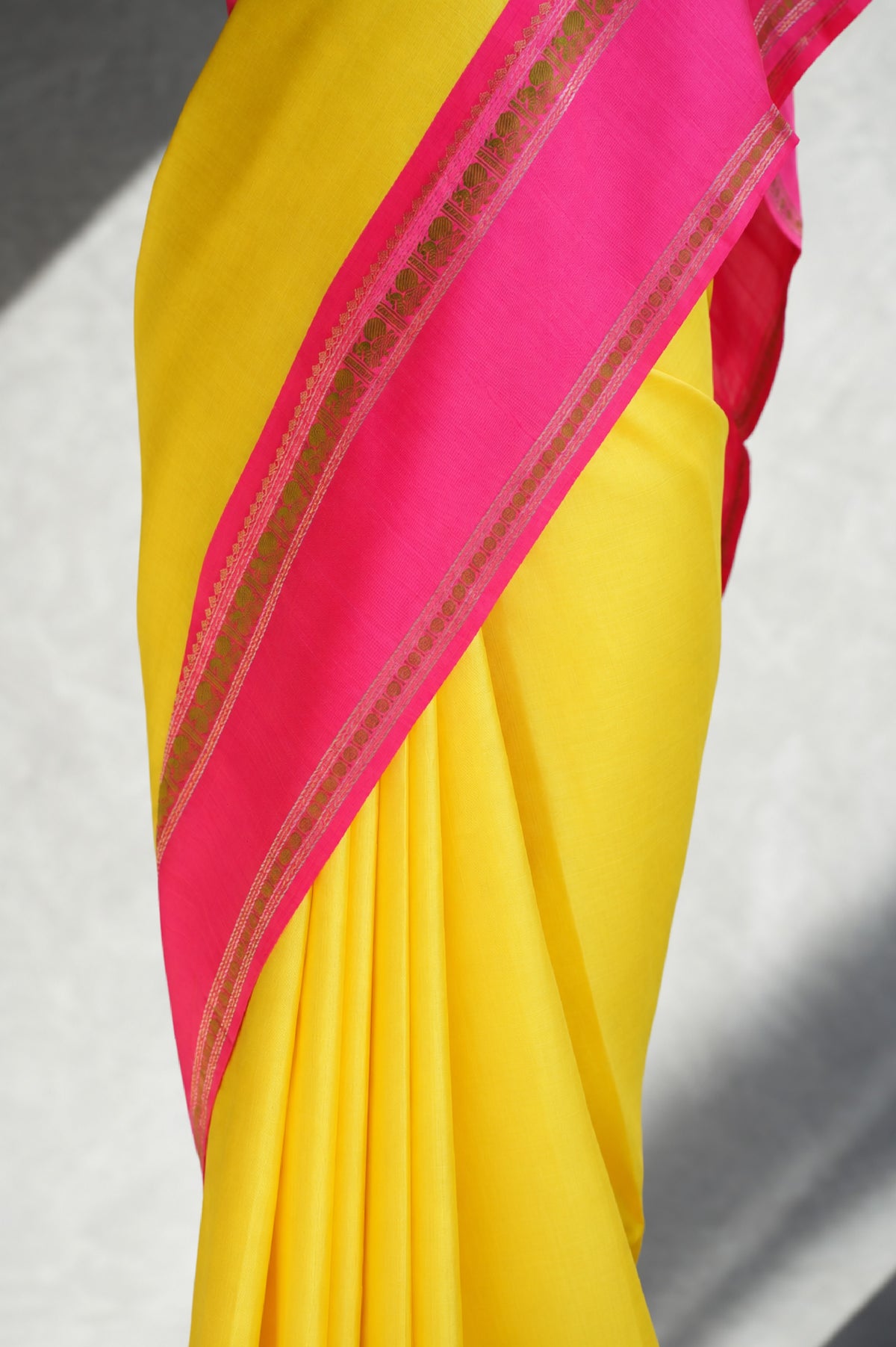 Sunshine Yellow Kanjivaram Silk with Rani Pink and Zari Border Saree