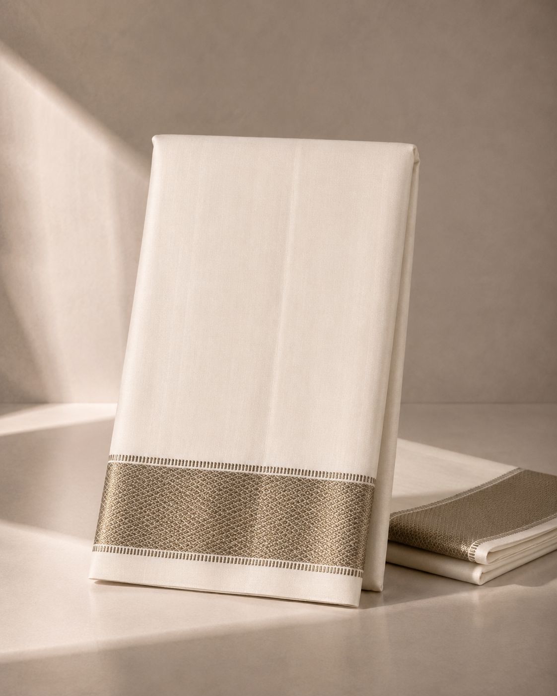 White Veshti with Silver Zari Kan Pettu Border