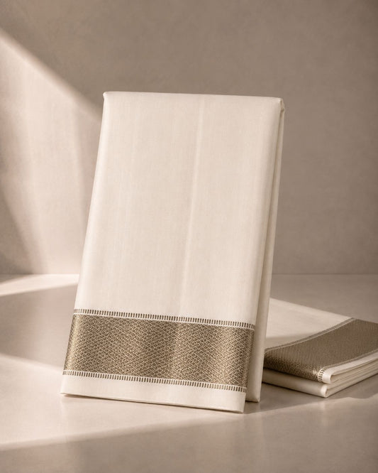 White Veshti with Silver Zari Kan Pettu Border