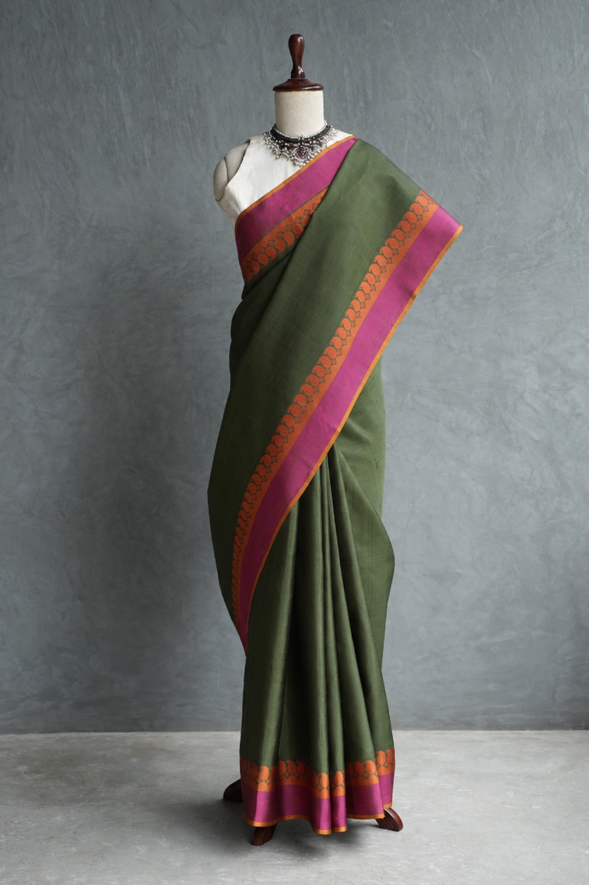 Olive Green Kanjivaram Silk with Orange and Magenta Pink Threadwork Border Saree