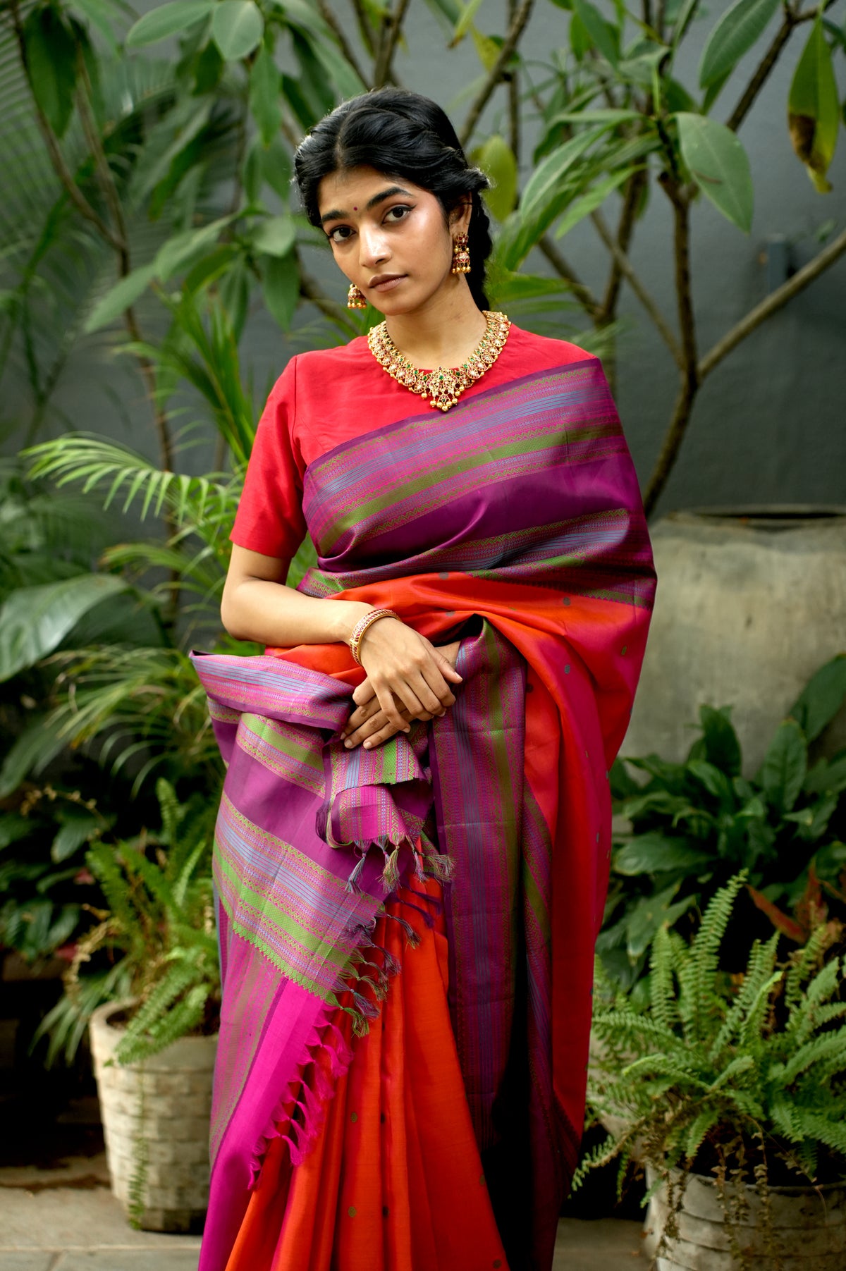 Vermilion Orange Kanchipuram Silk Saree with Multicolour Thread Work Border