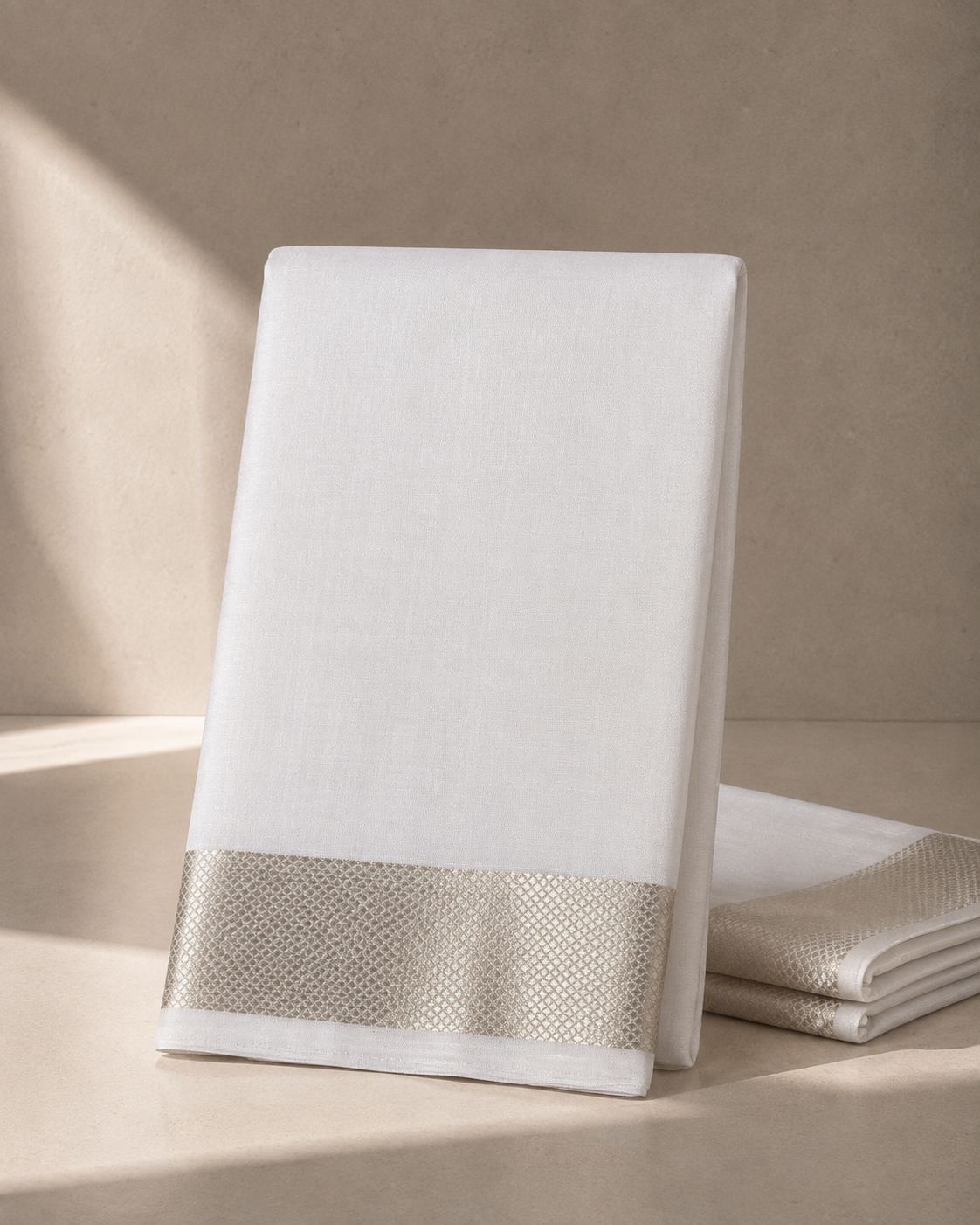 White Kanjivaram Silk Veshti with Silver Zari Kan Pettu Border